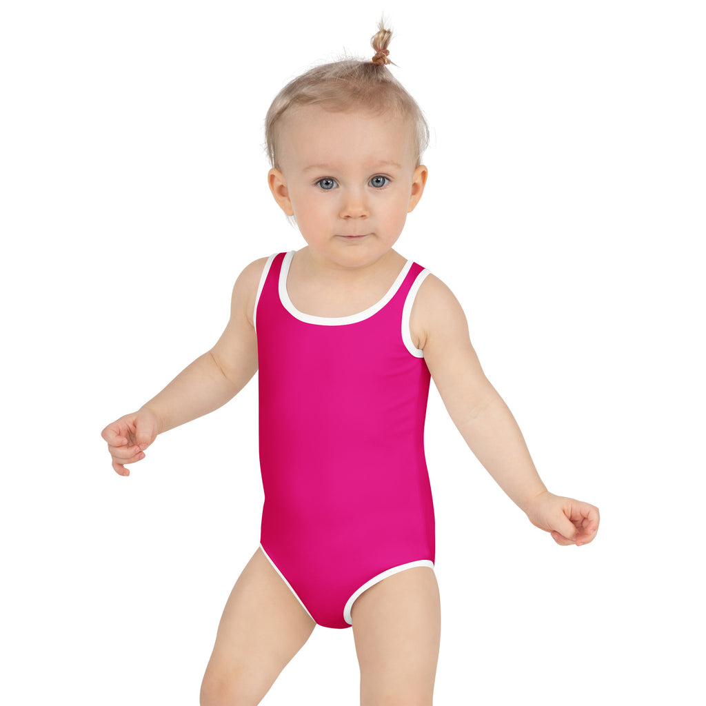 A vibrant fuchsia girls one-piece buttery soft swimsuit with white trim and UPF 50 plus sun protection