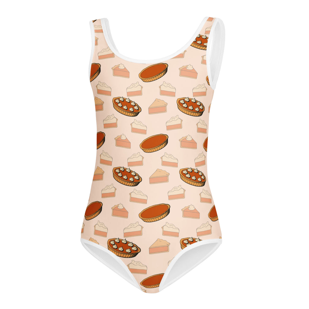 Peach-colored girls pumpkin pie soft leotard with white trim and pie pattern designed for dance and gymnastics