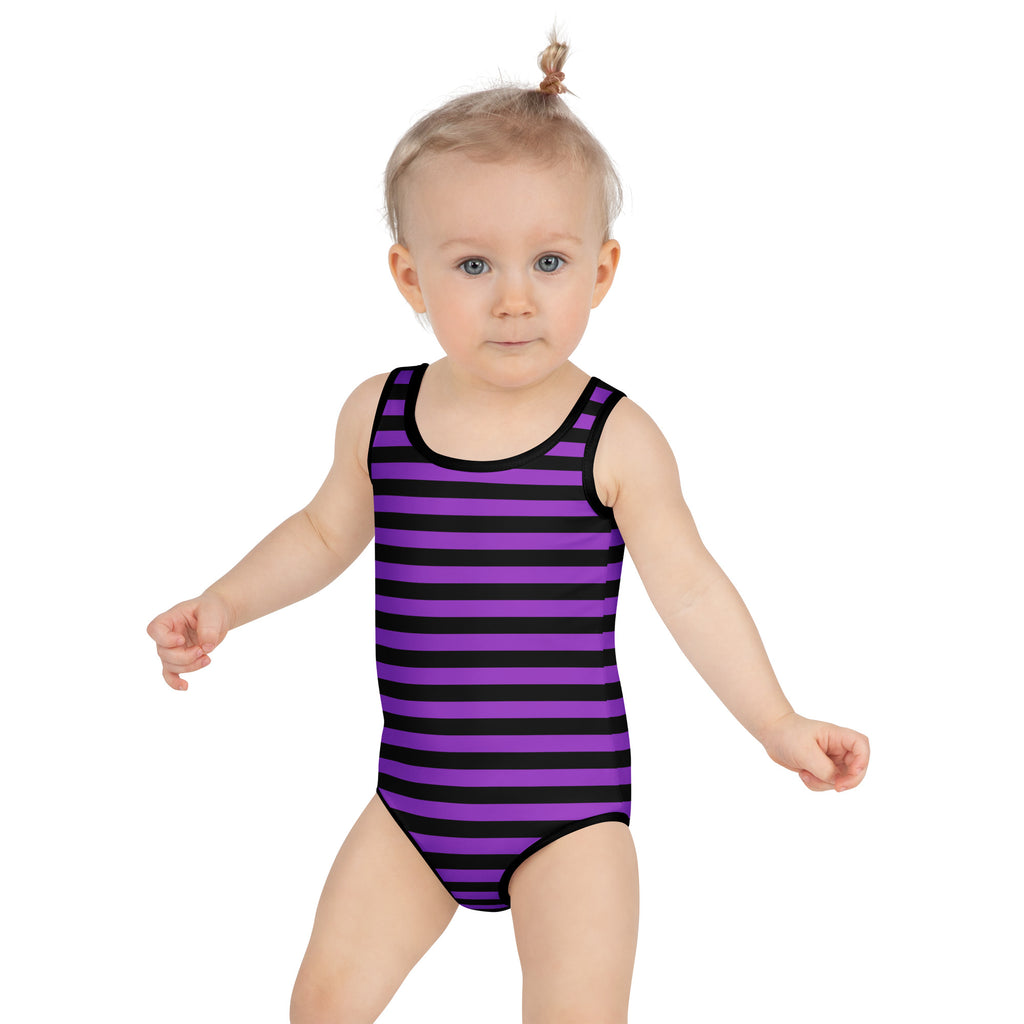 Girls purple and black striped buttery soft one-piece swimsuit for toddlers with upf 50 plus for Halloween use