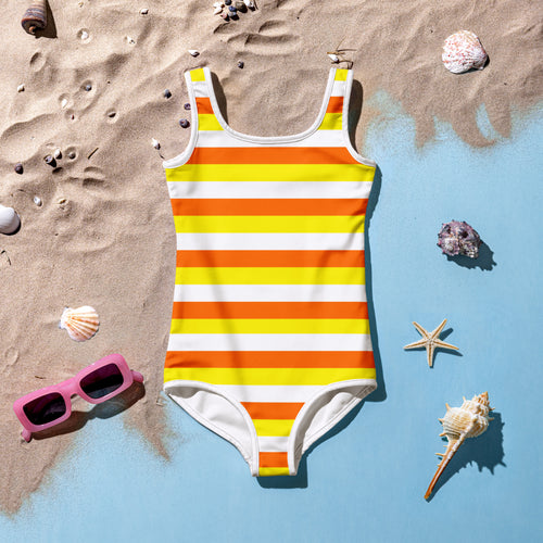 A vibrant orange and yellow striped girls candy corn stripes buttery soft swimsuit with white trim and UPF 50+ protection