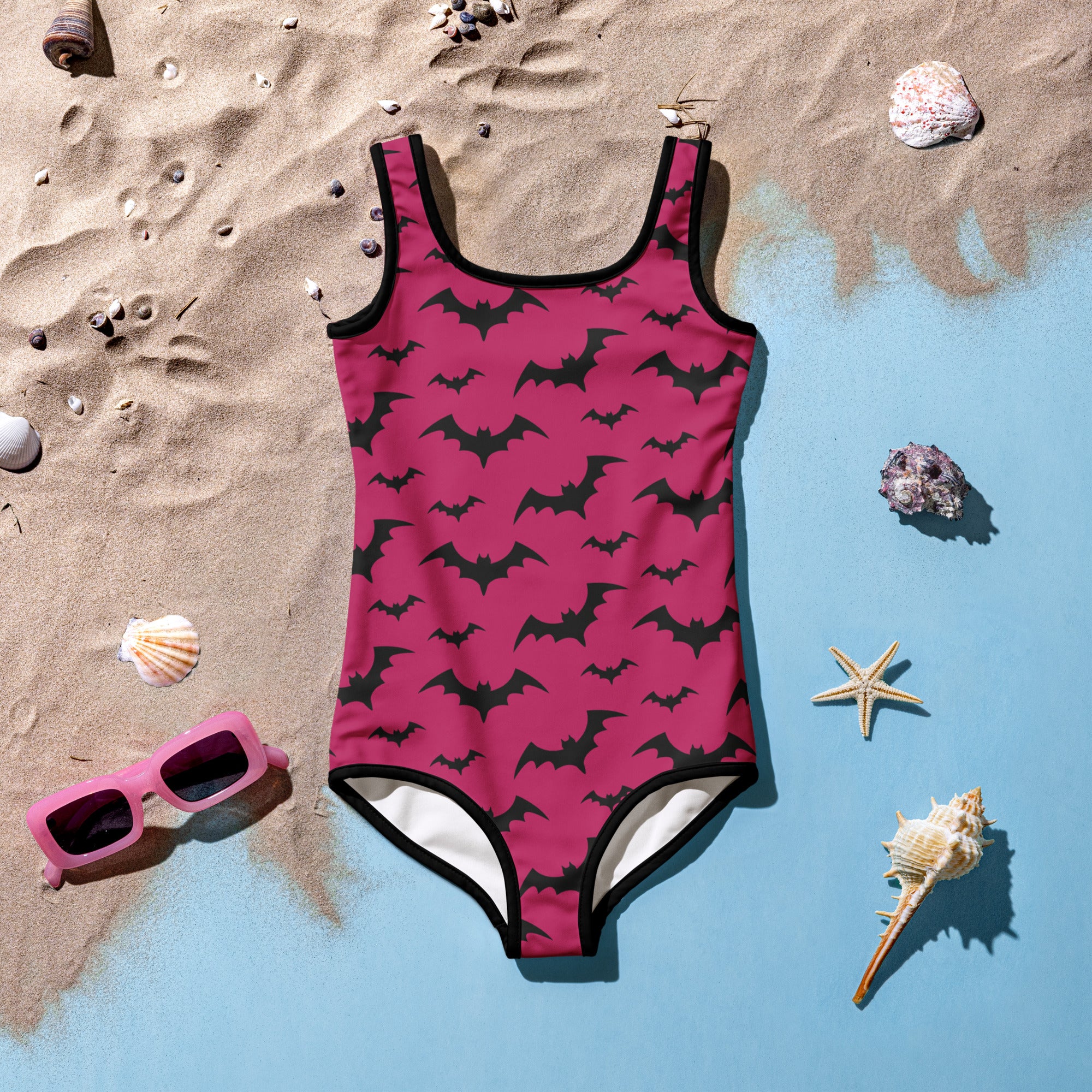 Girls pink bats halloween buttery soft swimsuit with vibrant pink color black bat pattern and black trim