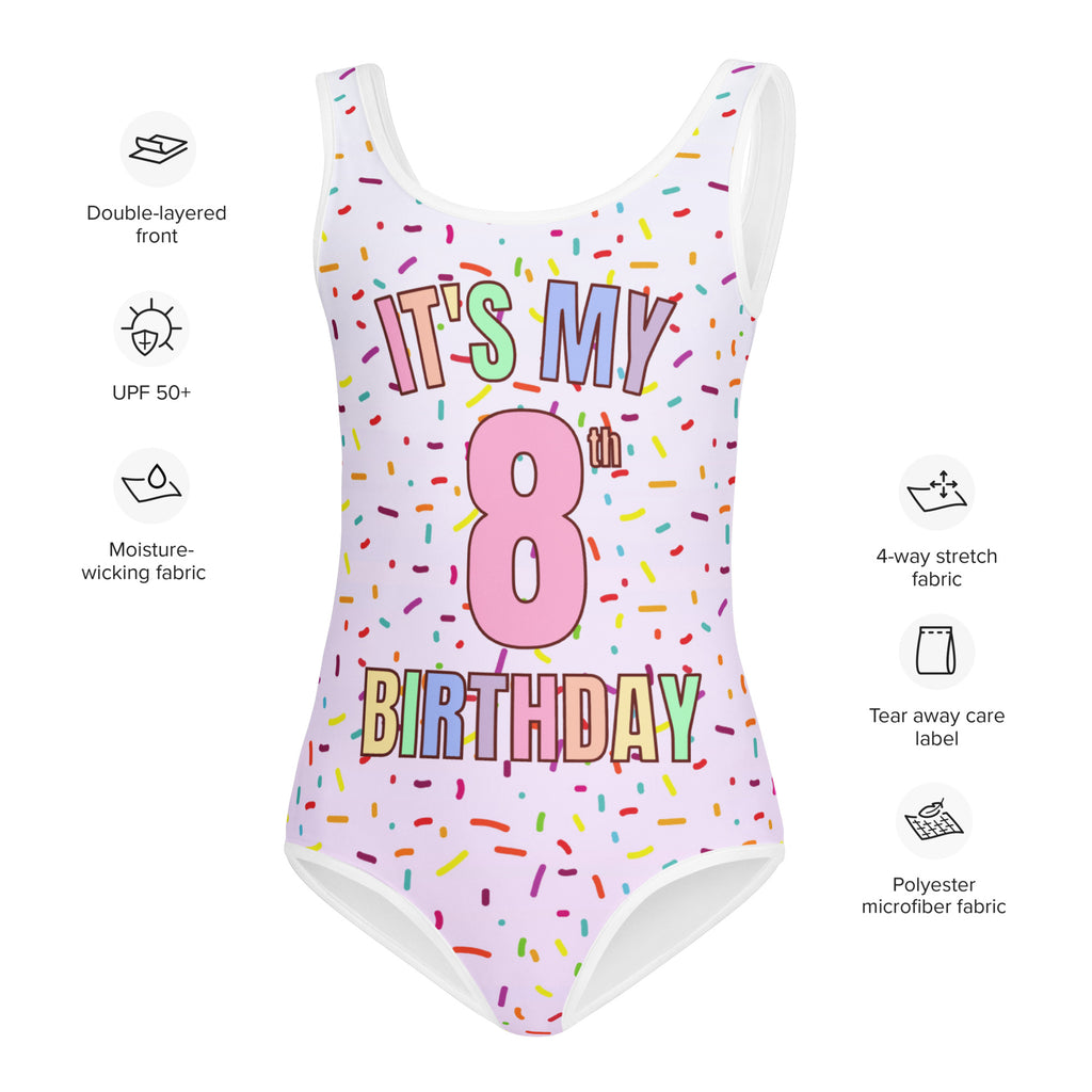 White one-piece swimsuit with colorful it’s my 8th birthday design rainbow sprinkles pink numerals polyester microfiber