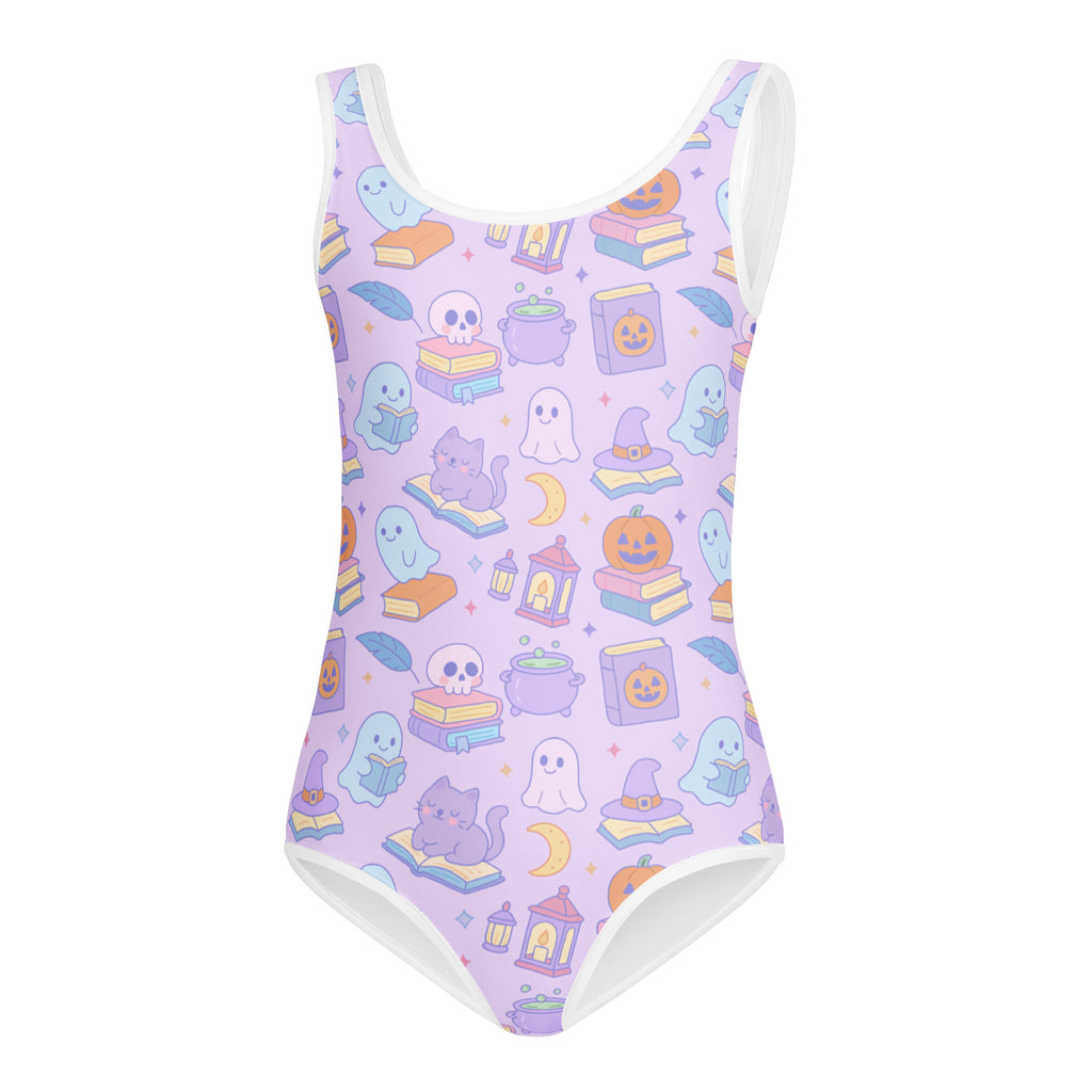 Lavender girls buttery soft leotard with white trim and pastel halloween book themed print for dance and gymnastics