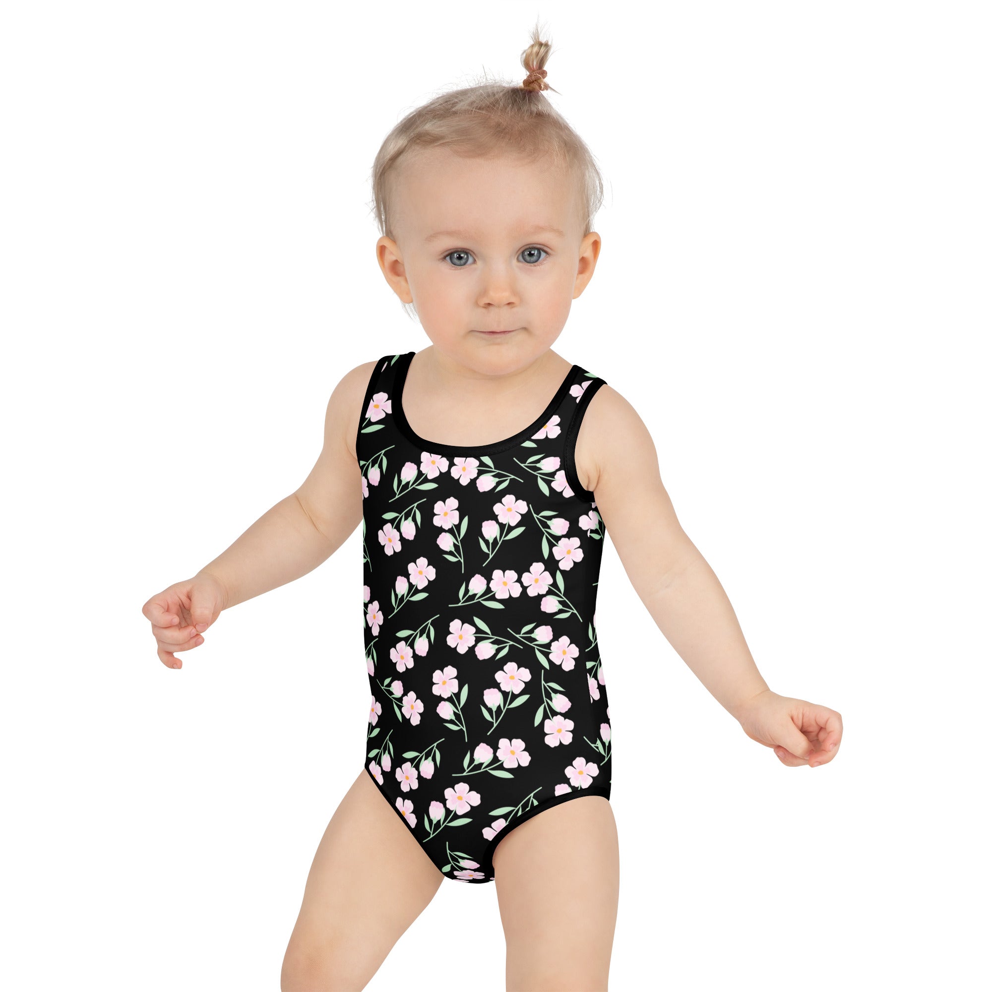 Black one-piece girls swimsuit with pink floral pattern buttery soft fabric and UPF 50 plus sun protection