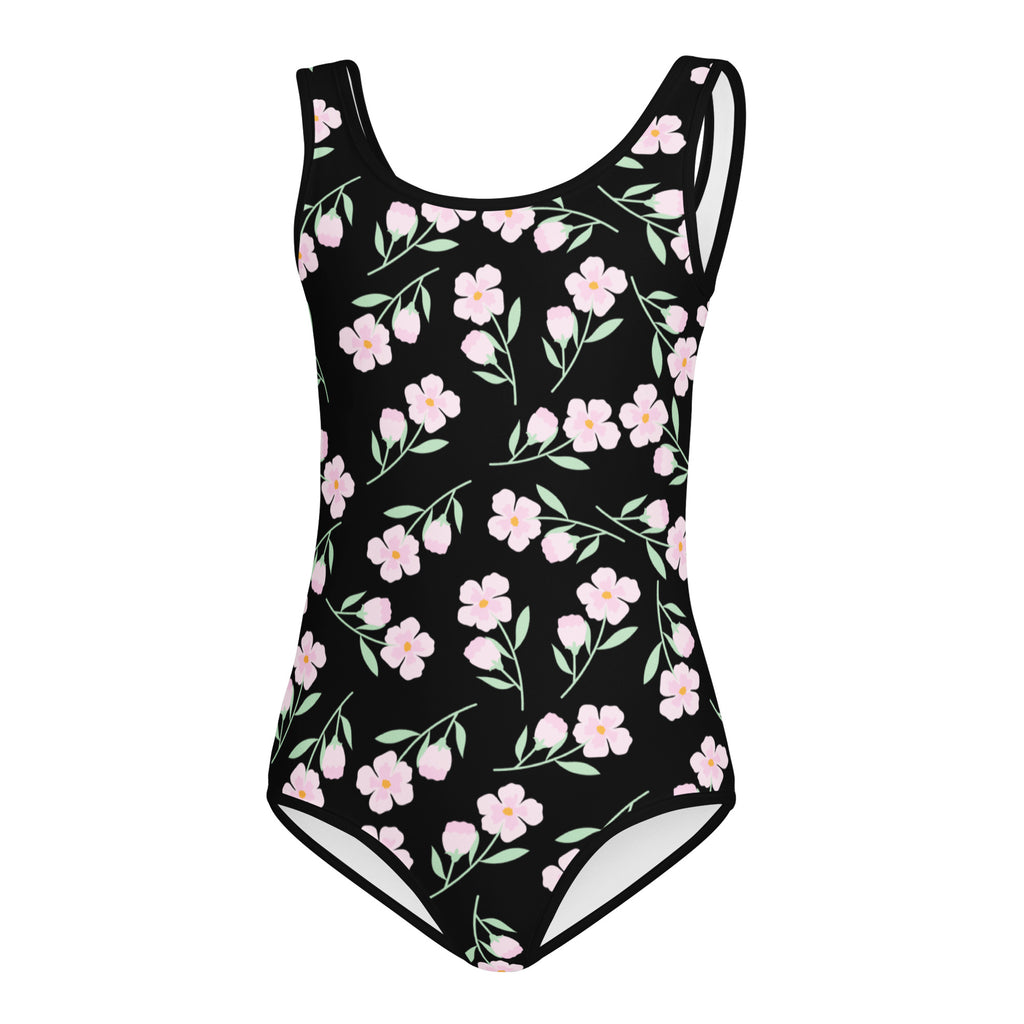 Girls black floral buttery soft leotard with delicate pink flowers and green leaves, thin straps, white trim, quick drying for dance and gymnastics