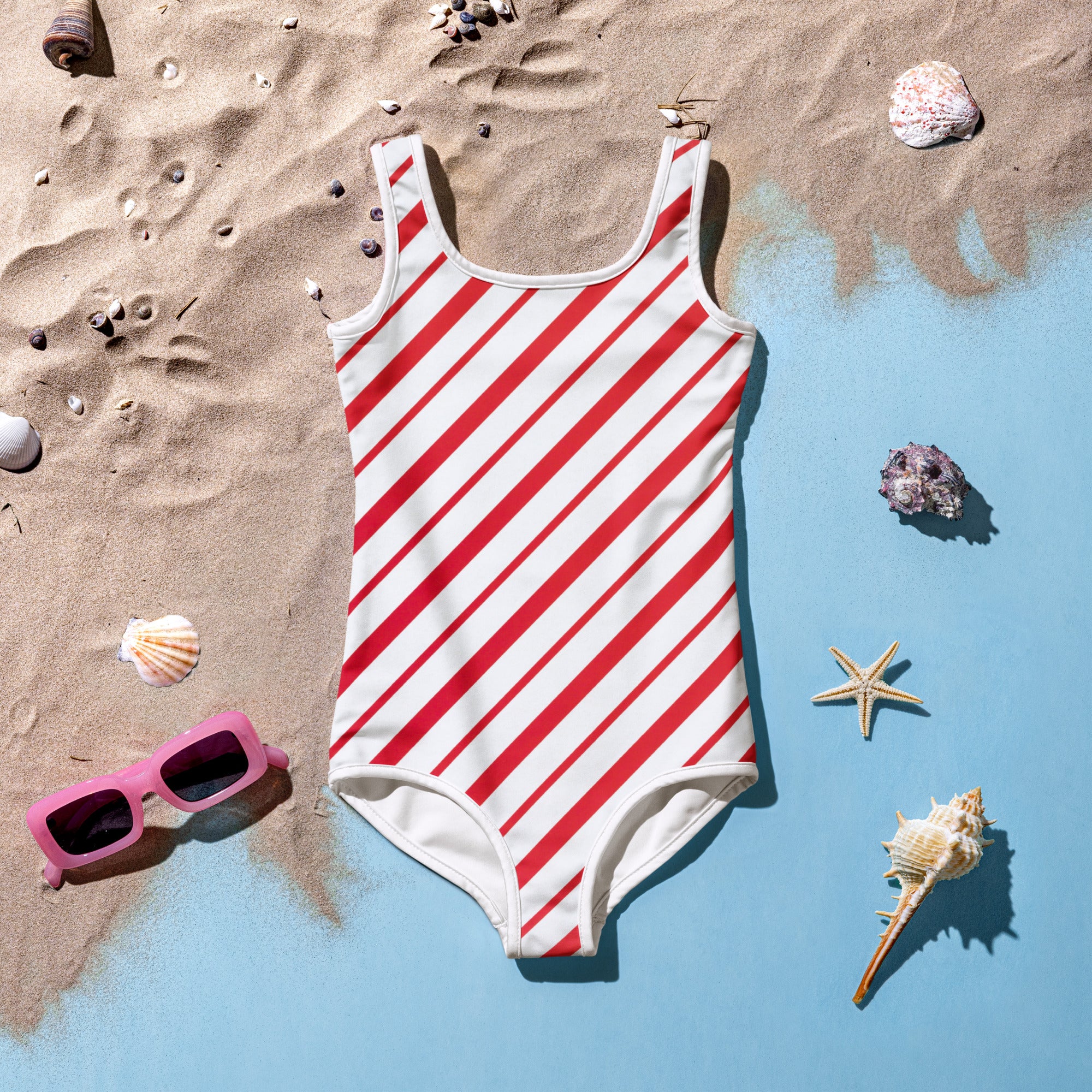 Girls candy cane stripe buttery soft swimsuit in red and white with upf 50 plus and square neckline sleeveless design