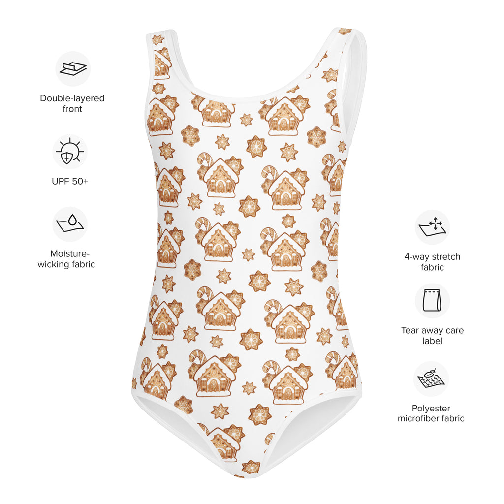 White one-piece swimsuit with festive golden brown gingerbread house and candy cane pattern for girls dance and gymnastics