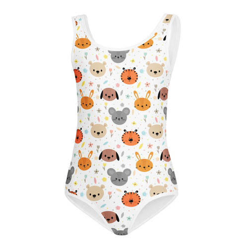 White one-piece swimsuit with playful orange beige and gray cartoon animal faces and floral accents for girls gymnastics