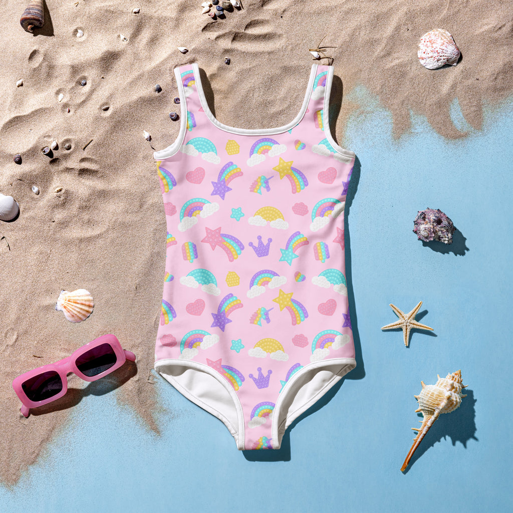 Pink girls fidget pop themed buttery soft swimsuit with playful rainbow star and crown pattern and upf 50+ protection