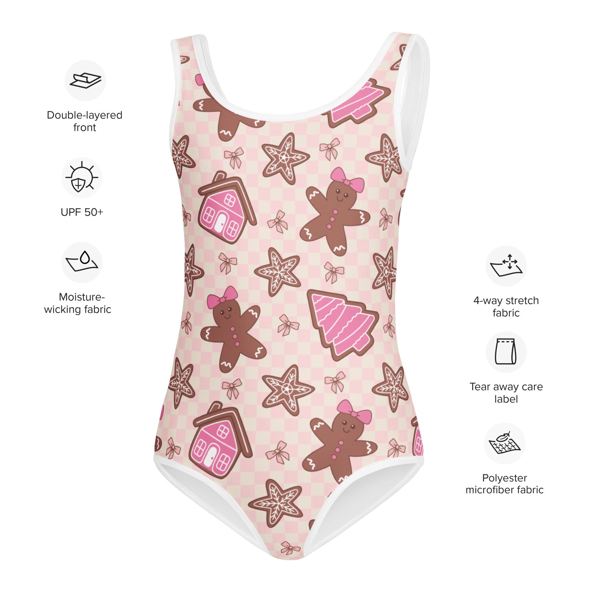 Girls pink quick drying leotard with festive gingerbread house star and cookie pattern for dance and gymnastics