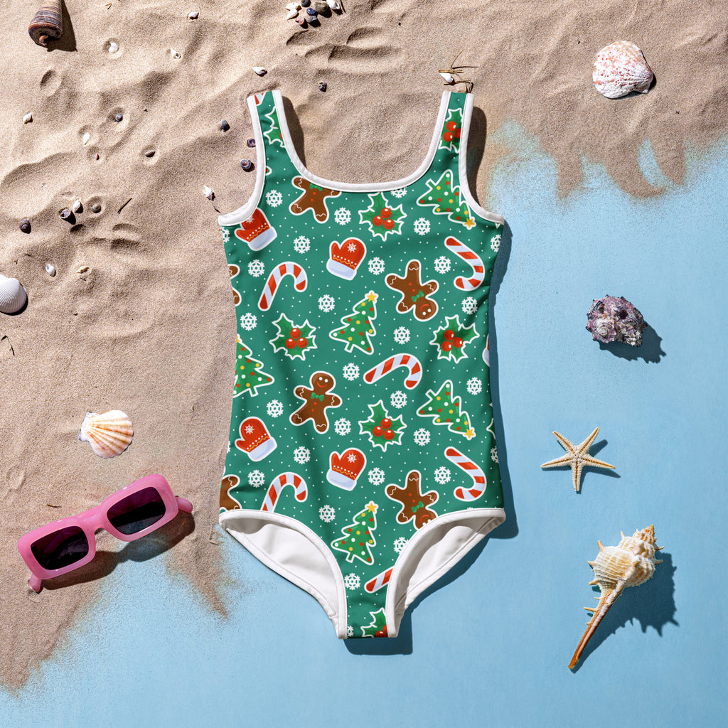Girls green Christmas cookie buttery soft one-piece swimsuit with UPF 50 plus and festive print on teal background