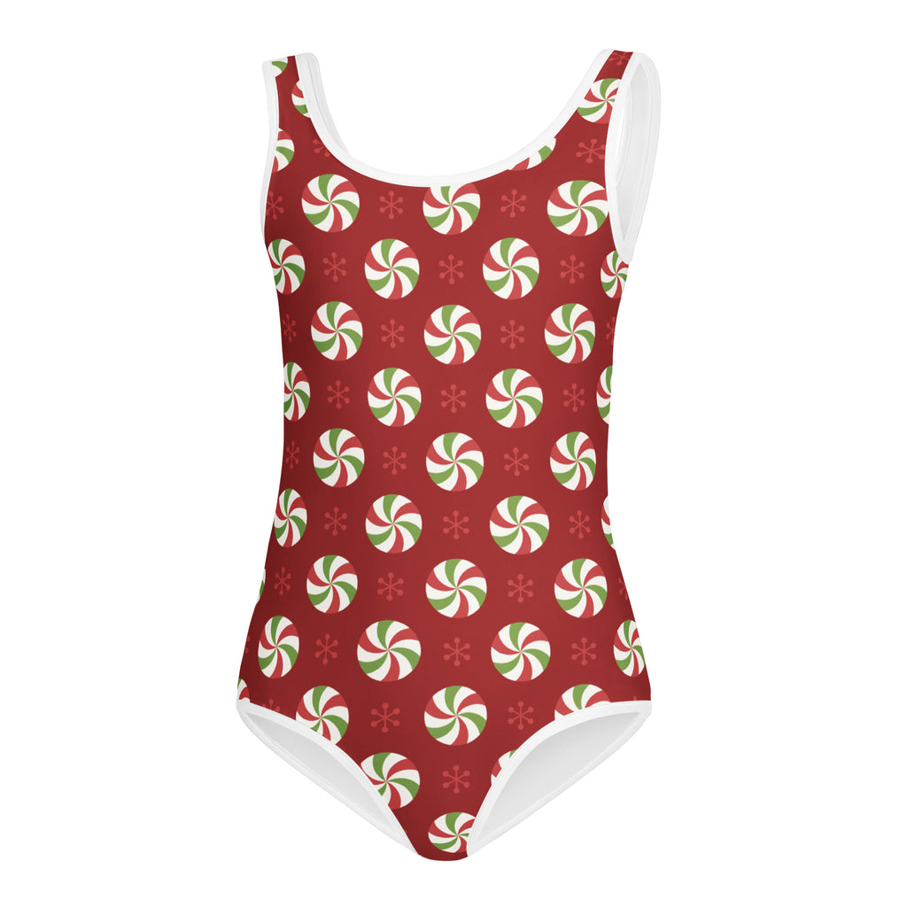A festive red buttery soft girls one-piece leotard with peppermint candy pattern for dance and gymnastics