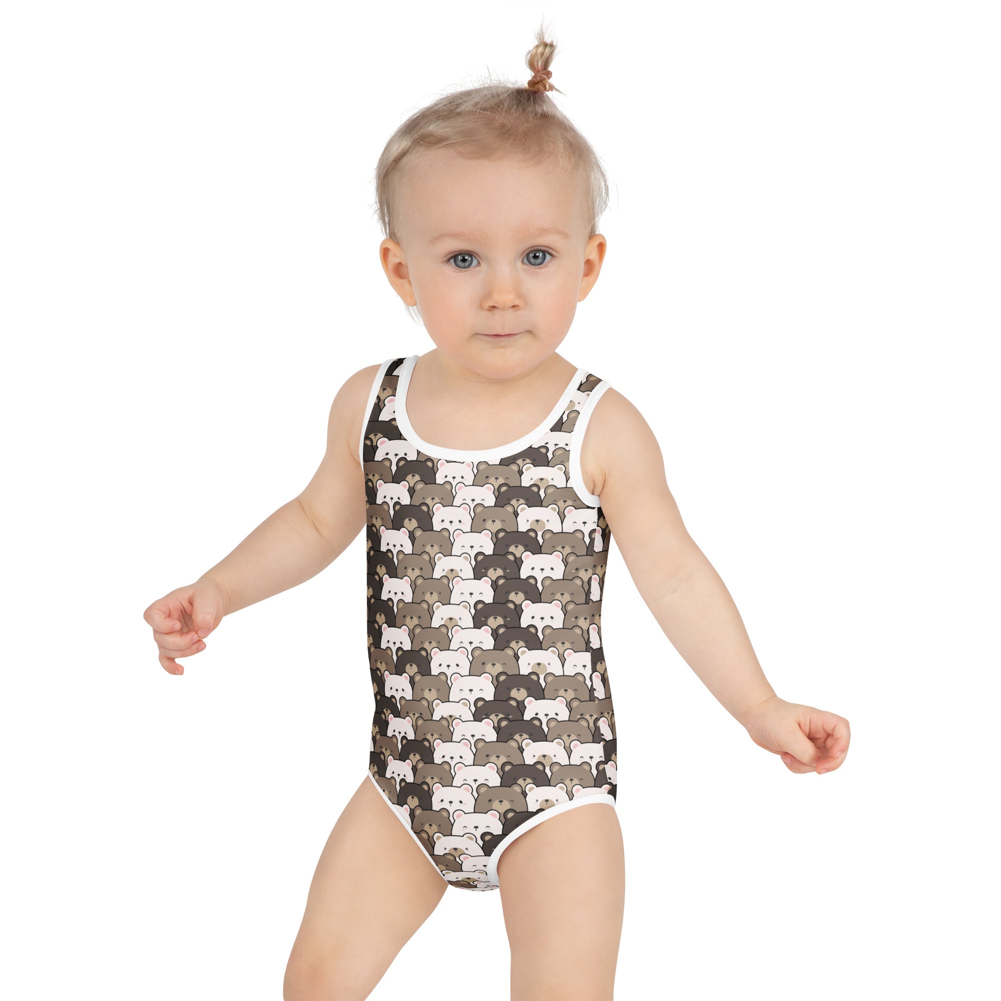 A toddler wearing a girls bear face buttery soft swimsuit with upf 50 plus featuring cartoon bears pattern