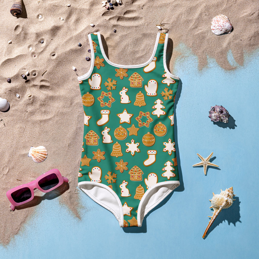Girls green gingerbread cookies christmas buttery soft swimsuit with upf 50 plus featuring snowmen stars and ornaments pattern