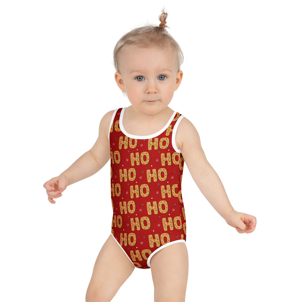 Girls red one-piece buttery soft swimsuit with white trim ho ho ho gold lettering and UPF 50 plus sun protection