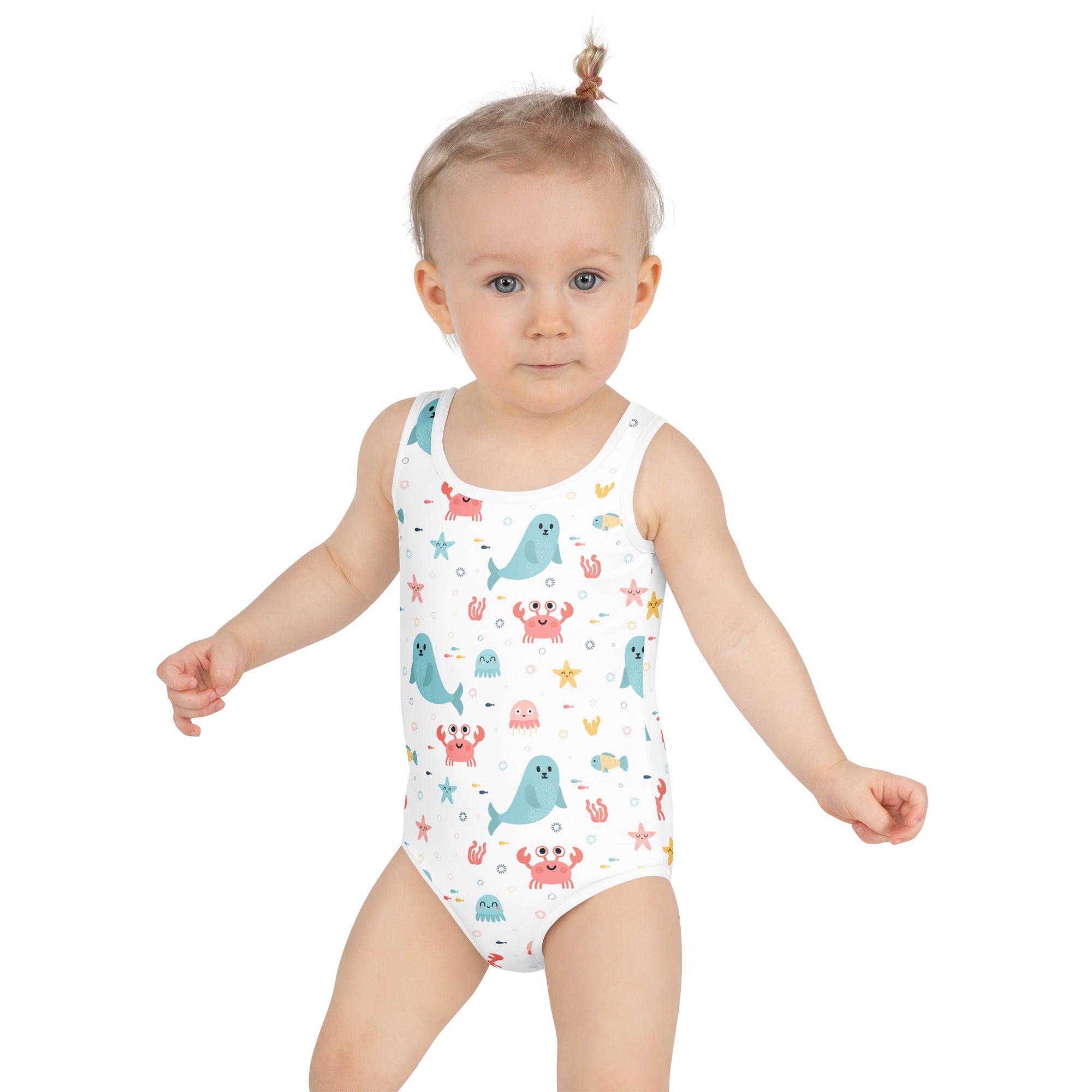 White girls one-piece swimsuit with playful teal pink and yellow sea animals pattern buttery soft fabric upf 50+