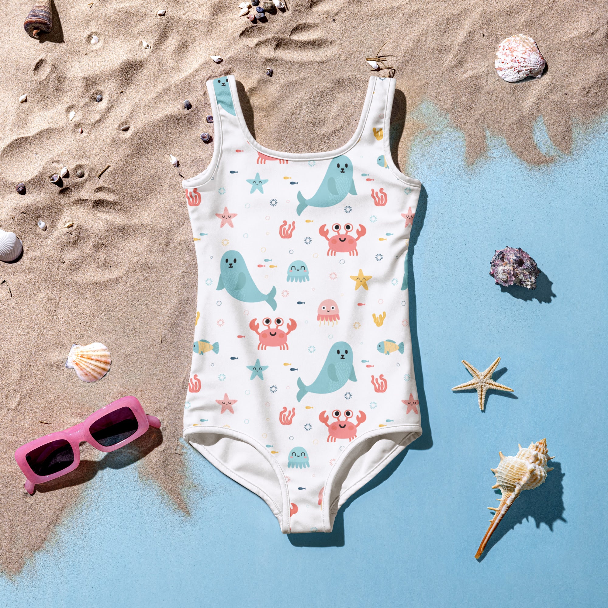 White girls sea animal buttery soft swimsuit with upf 50 plus featuring light blue whales pink crabs and starfish pattern