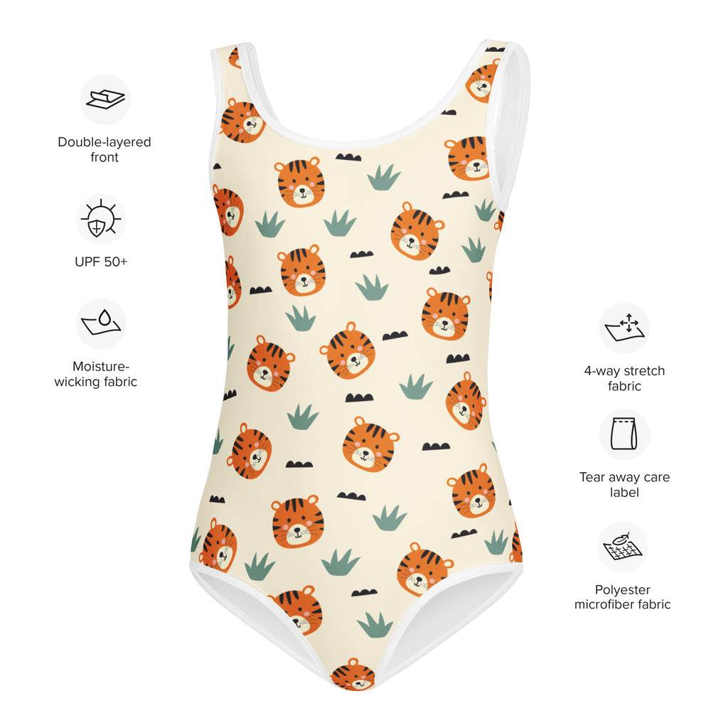 Cream-colored girls one-piece swimsuit with orange tiger faces and green plants made of buttery soft polyester microfiber with UPF 50+