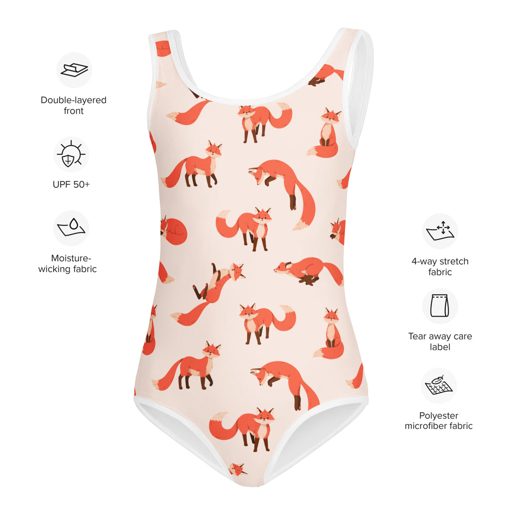 Girls orange fox buttery soft one-piece swimsuit with playful fox pattern on peach background and white trim with UPF 50+