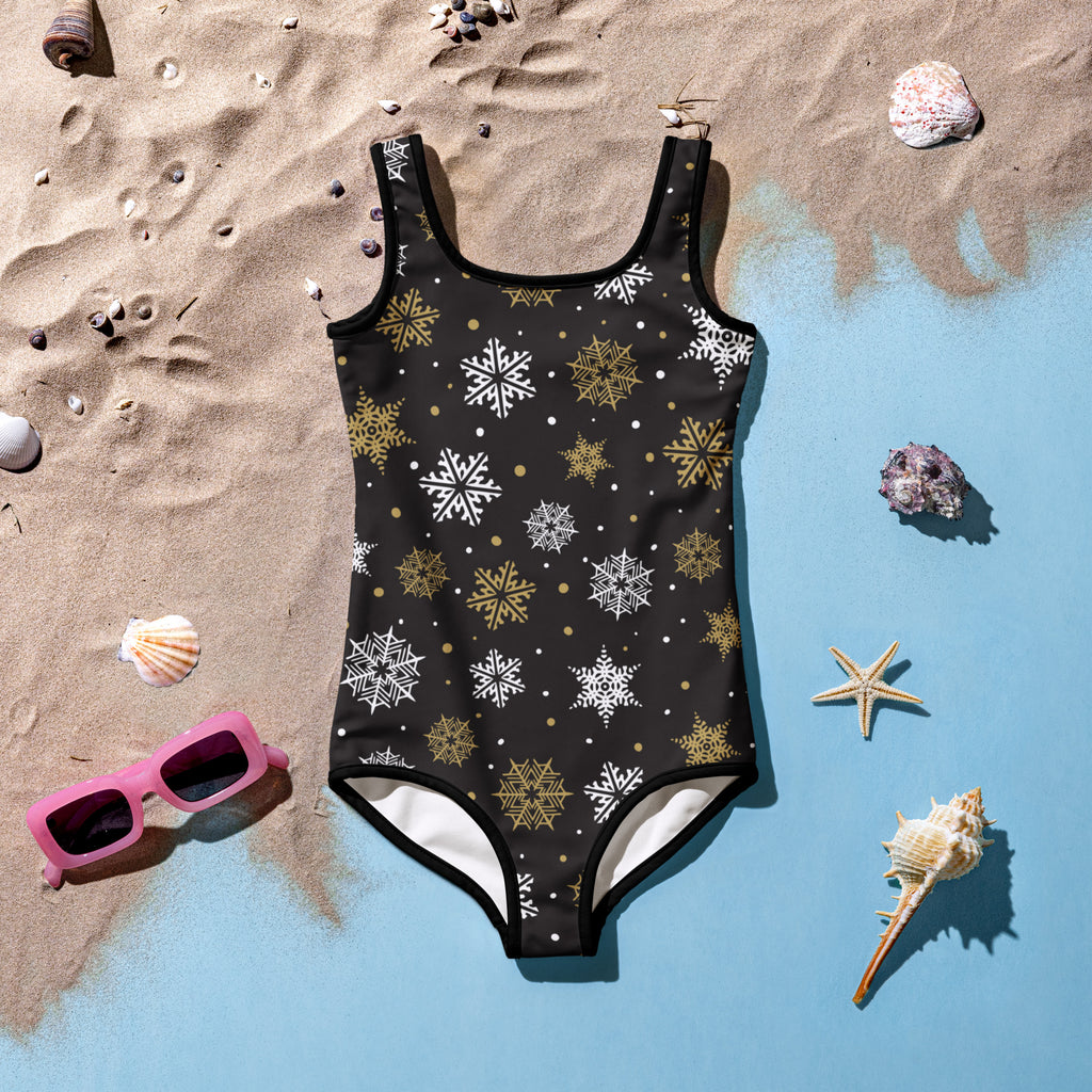Girls black one-piece swimsuit with white and gold snowflakes buttery soft fabric UPF 50 plus for Christmas