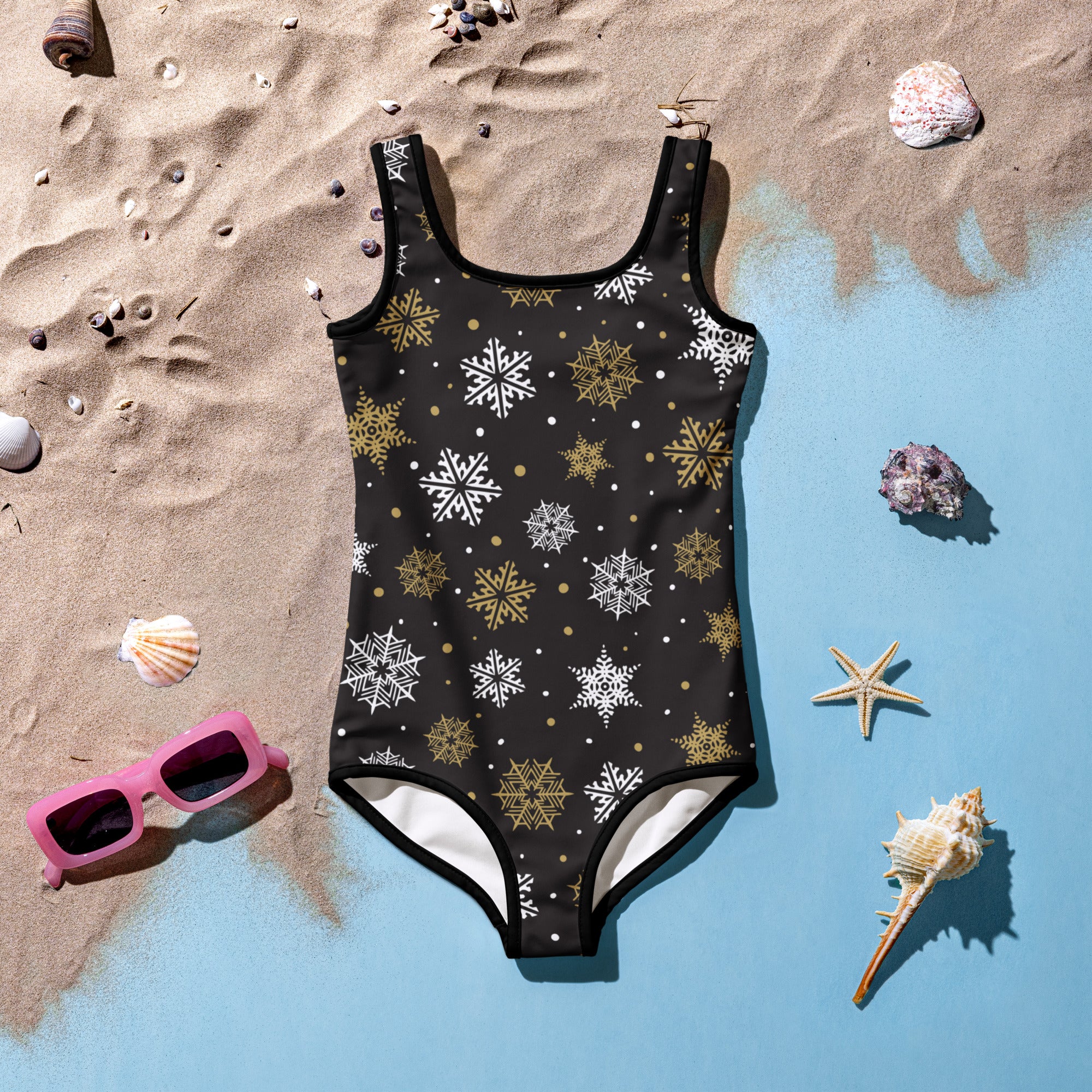 Girls black one-piece swimsuit with white and gold snowflakes buttery soft fabric UPF 50 plus for Christmas