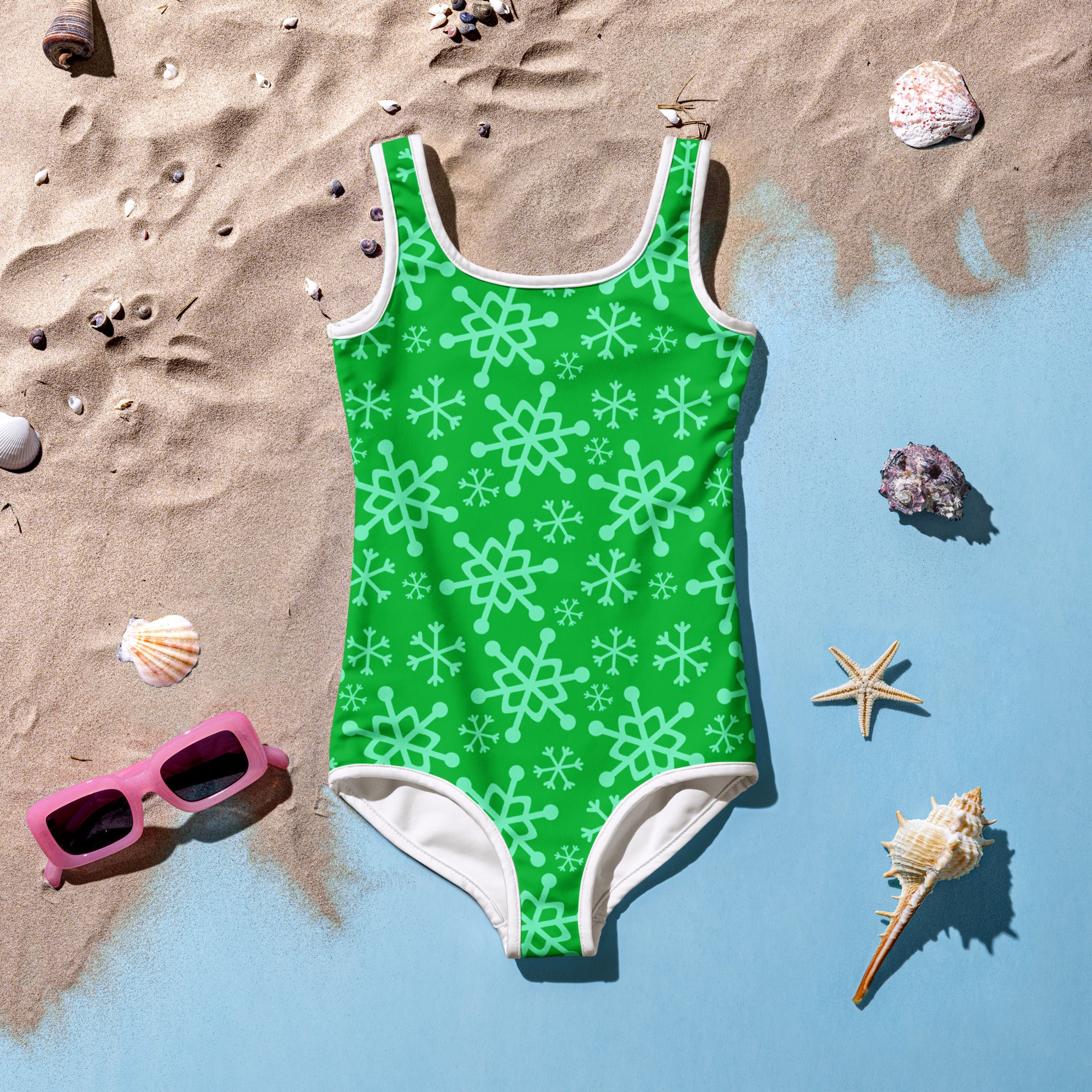 Girls green snowflake one-piece swimsuit with white trim buttery soft fabric and UPF 50 plus sun protection