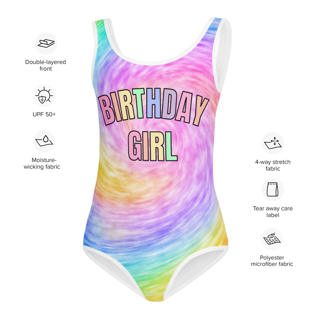 A vibrant rainbow tie dye birthday girl buttery soft one-piece swimsuit with colorful outlined letters for dance and gymnastics