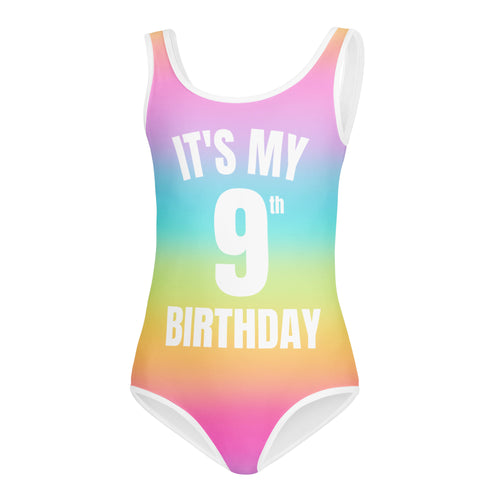 Girls bright rainbow gradient one-piece swimsuit with white trim and its my 9th birthday text for dance and gymnastics