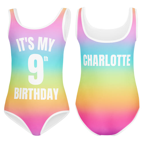 Girls bright rainbow one-piece swimsuit with custom age and name on back made of smooth stretchy fabric for dance and gymnastics