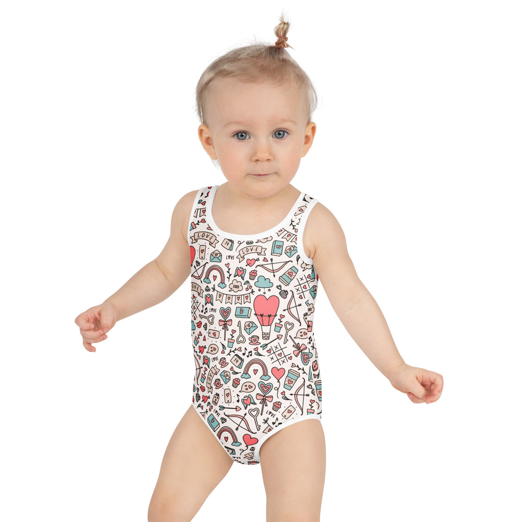 White girls one-piece swimsuit with playful hearts and rainbows pattern buttery soft fabric upf 50 plus protection