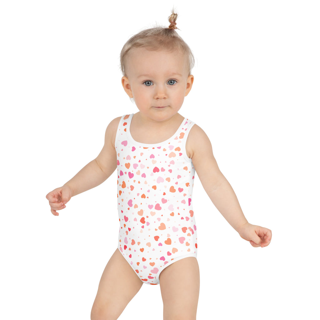 White girls one-piece swimsuit with pink and orange heart pattern buttery soft fabric and upf 50 plus protection