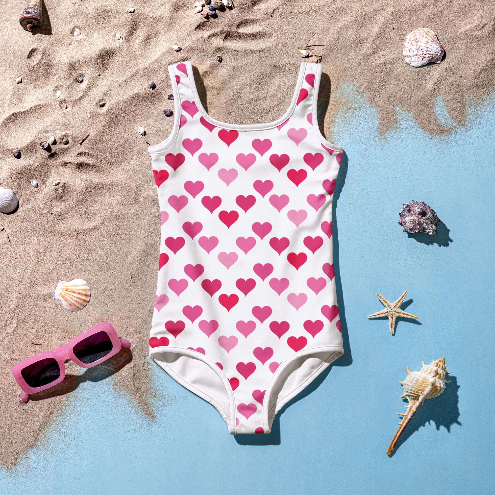 Girls Valentine’s Day white one-piece swimsuit with pink heart pattern buttery soft fabric square neckline UPF 50+