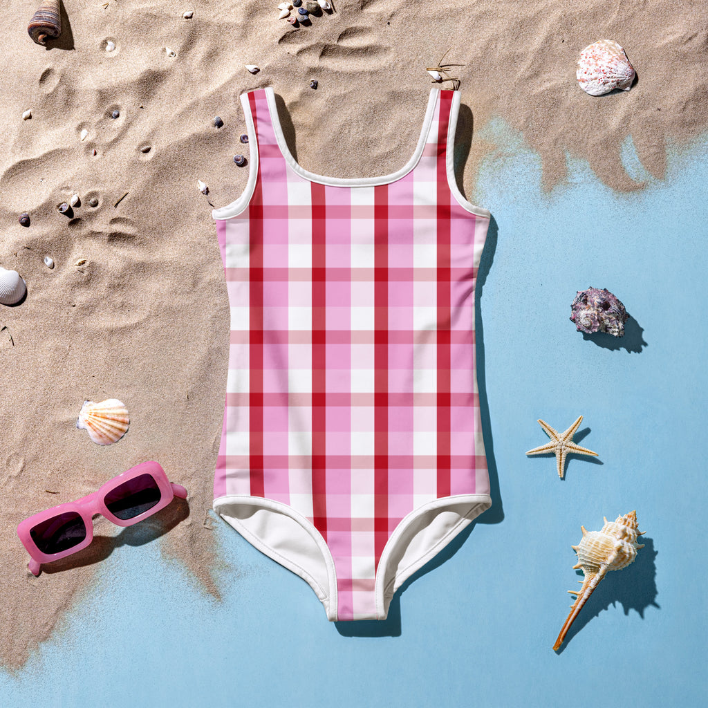 Girls Valentine’s Day gingham buttery soft one-piece swimsuit in pink and red plaid with white trim and UPF 50 plus protection