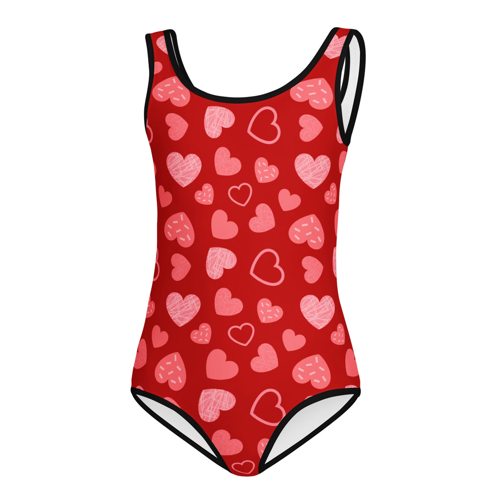 Girls red heart pattern buttery soft leotard with black trim and white lining designed for dance and gymnastics