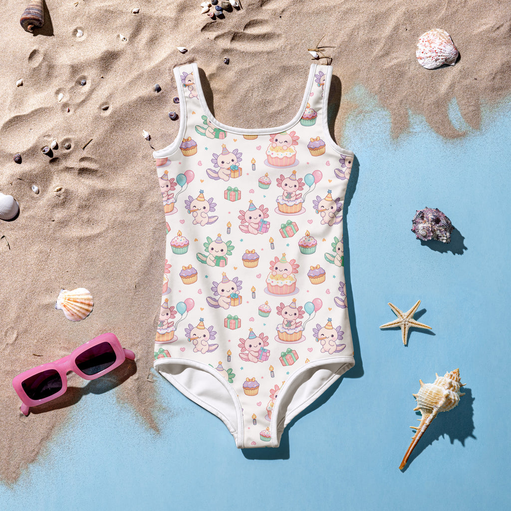 Girls white one-piece swimsuit with pastel axolotl birthday cupcake pattern buttery soft UPF 50 plus double layered front