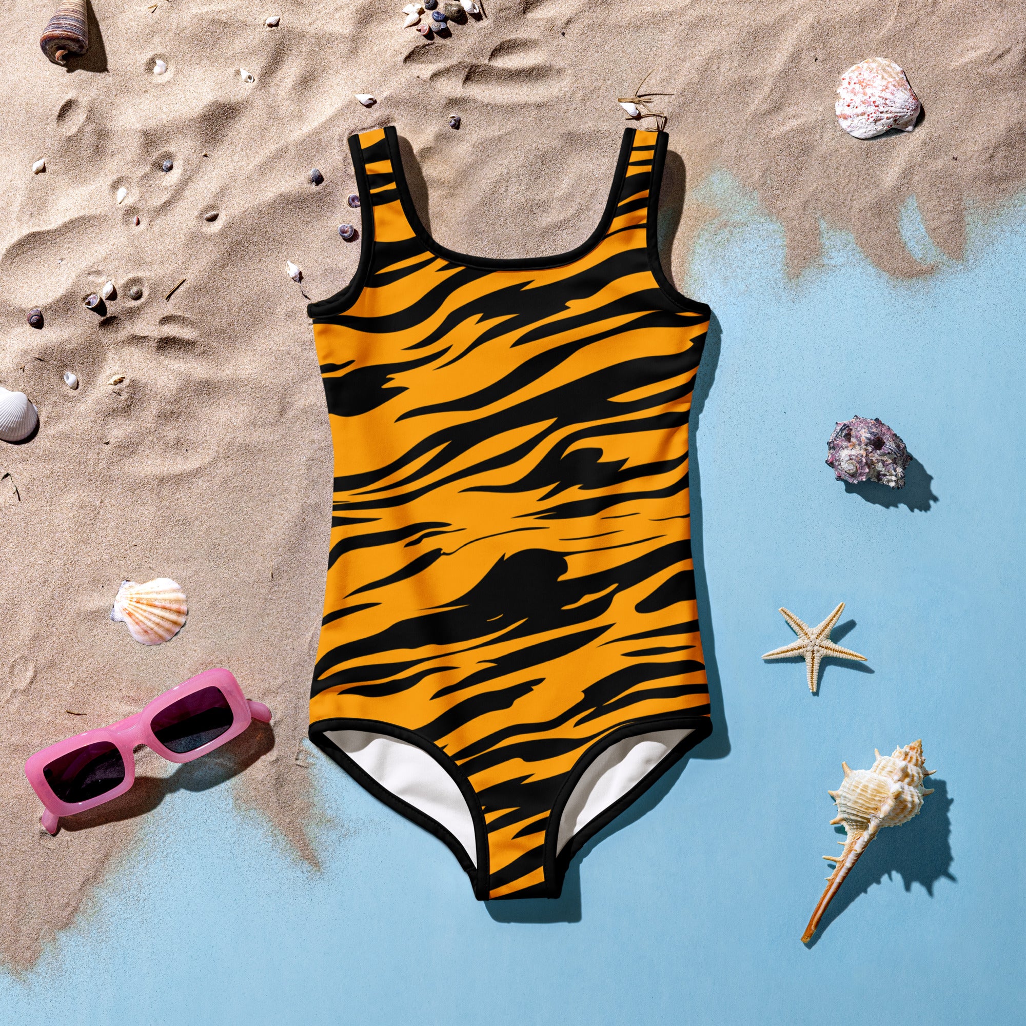 Girls tiger stripe buttery soft one-piece swimsuit in orange and black with square neckline and white trim leg openings upf 50+