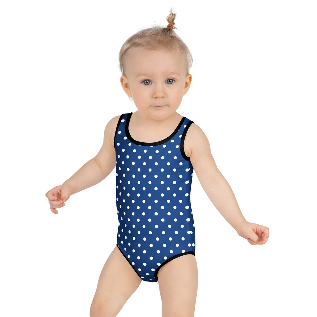 Girls dark blue polka dot buttery soft one-piece swimsuit with black trim and UPF 50 plus sun protection