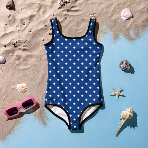 Girls dark blue polka dot buttery soft one-piece swimsuit with white dots black trim and upf 50 plus double layered front