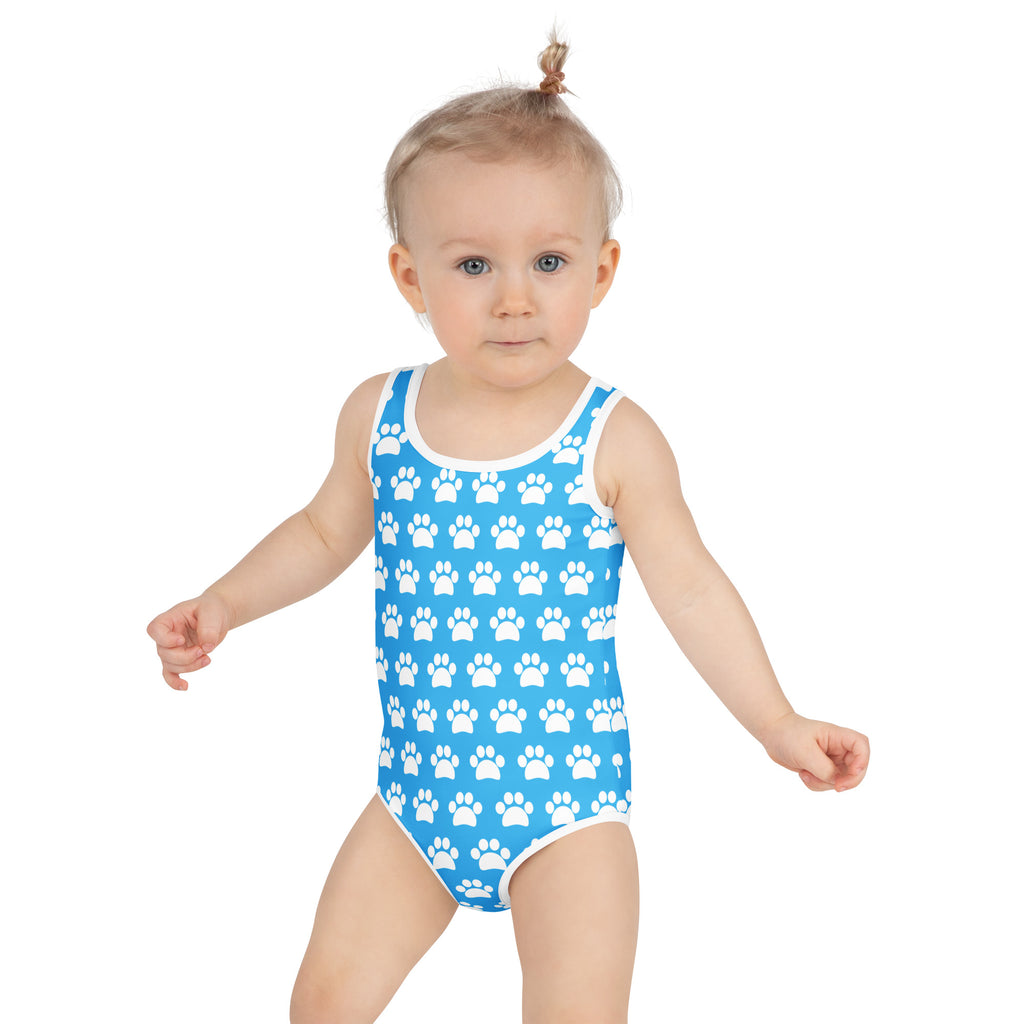 Girls sky blue buttery soft one-piece swimsuit with white paw print pattern white trim and UPF 50 plus protection
