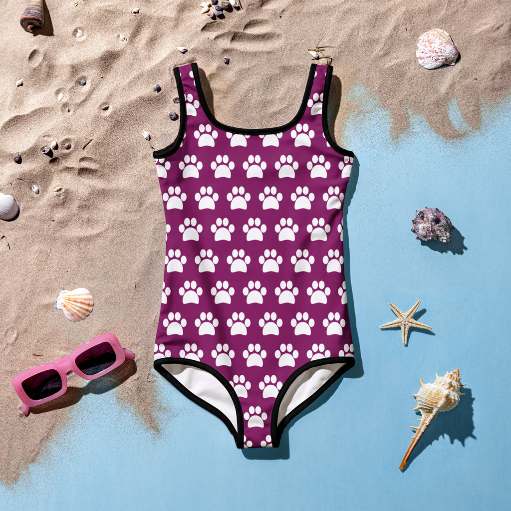 Girls purple buttery soft one-piece swimsuit with white paw print pattern black trim UPF 50 plus double layered front