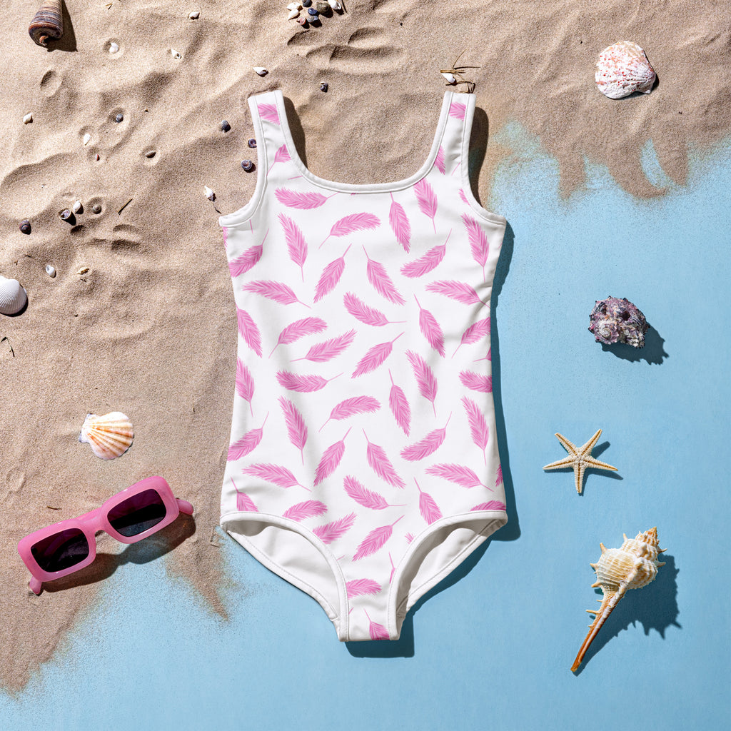 A white girls one-piece swimsuit with pink flamingo feather pattern buttery soft fabric and UPF 50+ protection