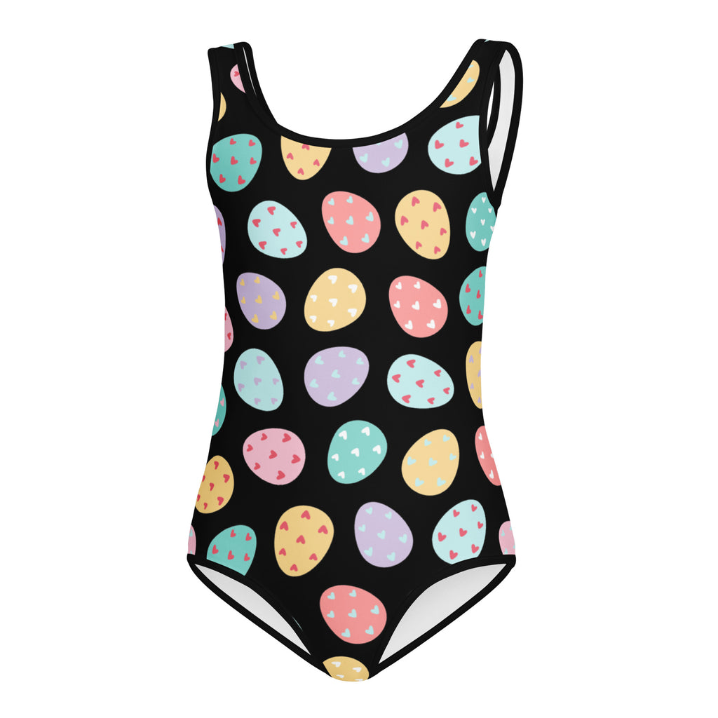 Black one-piece buttery soft swimsuit with colorful pastel easter eggs and tiny heart patterns for dance and gymnastics