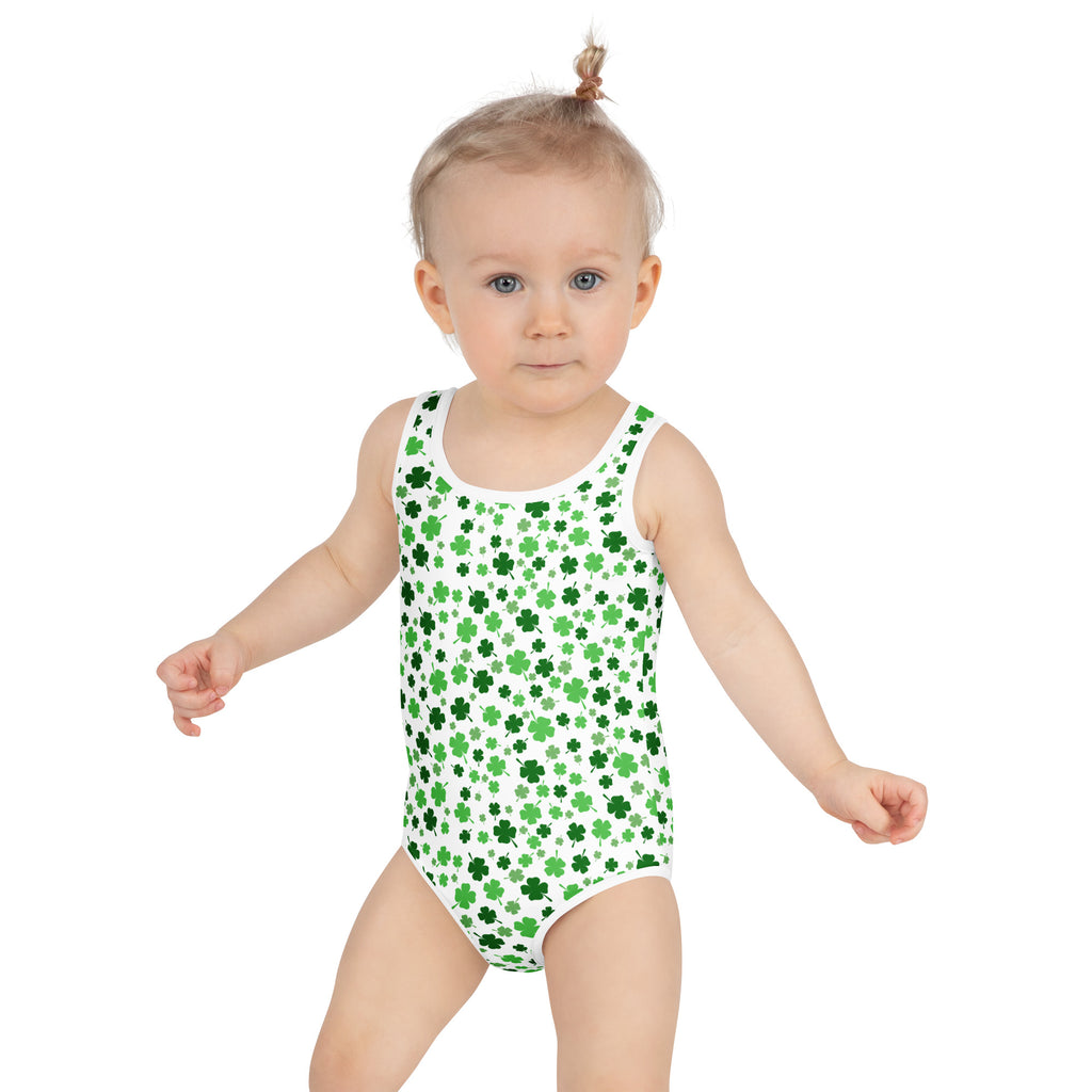 White one-piece girls swimsuit with green shamrock print buttery soft fabric and upf 50 plus protection