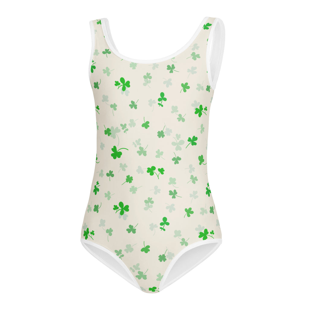 Cream-colored girls St Patricks Day one-piece leotard with white trim and soft shamrock pattern for dance and gymnastics