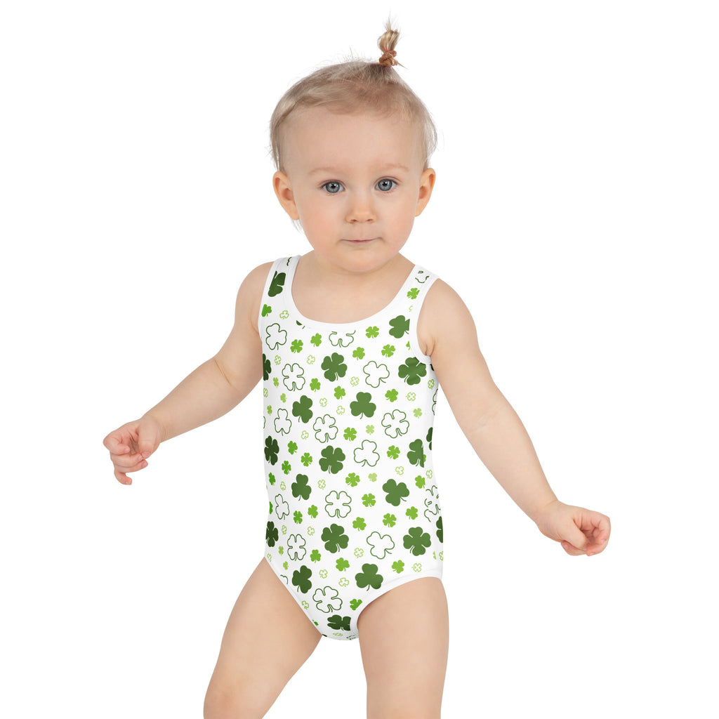 Girls shamrock buttery soft white one-piece swimsuit with green four-leaf clovers and UPF 50 plus double layered front