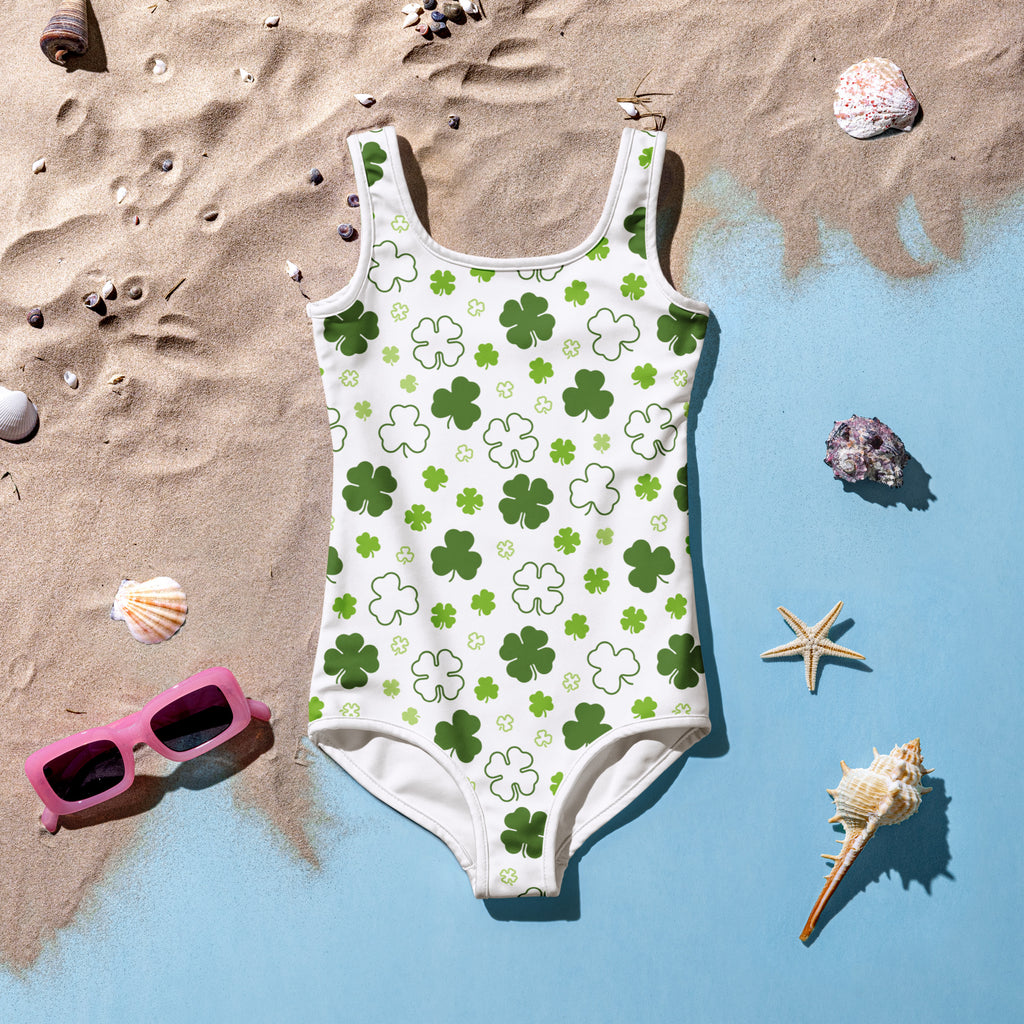 Girls shamrock buttery soft swimsuit in white with green shamrock pattern upf 50 plus double layered front