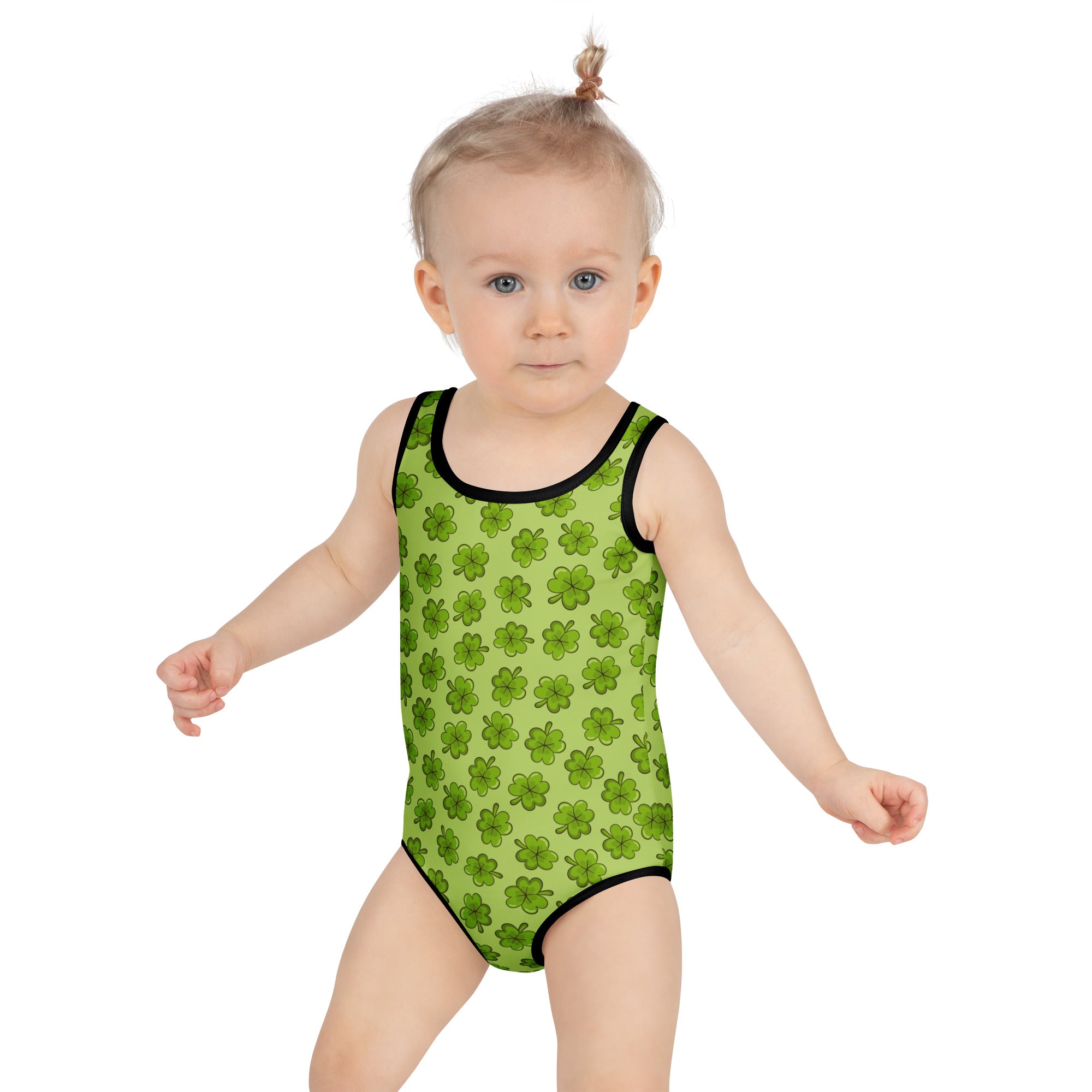 Bright green girls clover buttery soft swimsuit with black trim shamrock pattern upf 50 plus double layered front