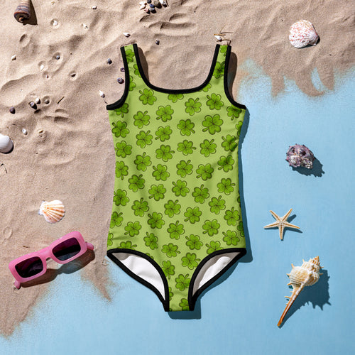 Girls clover buttery soft lime green one-piece swimsuit with clover pattern black trim and UPF 50 plus protection