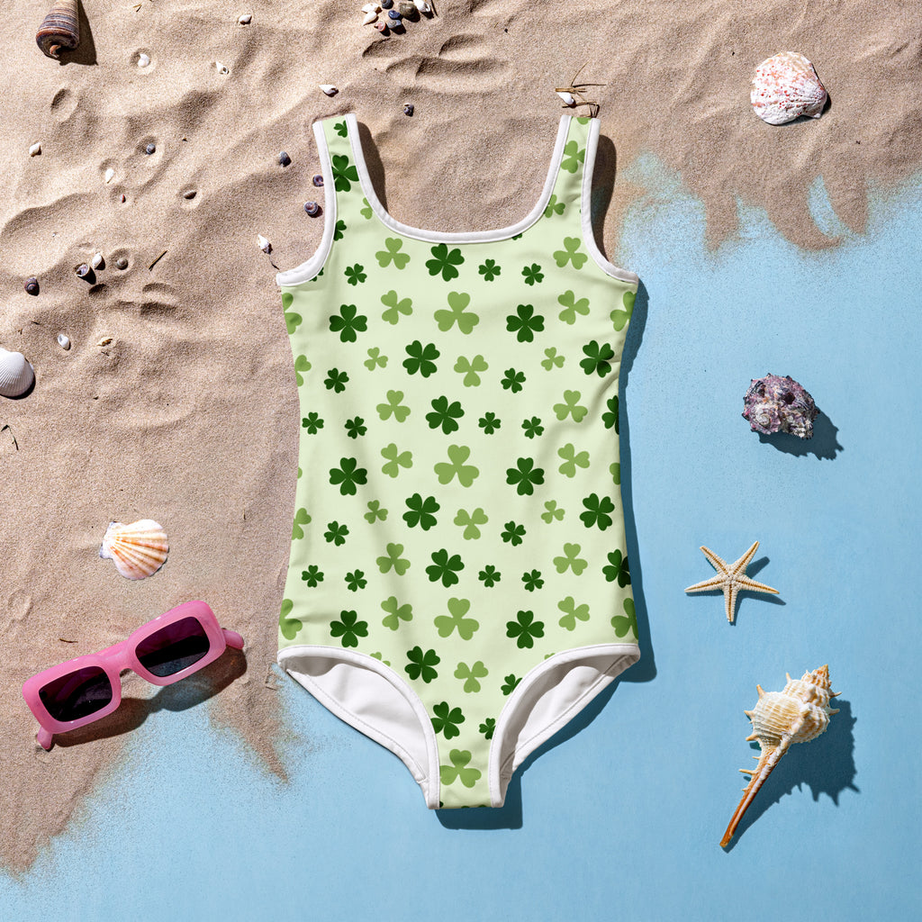 Girls light green shamrock buttery soft one-piece swimsuit with dark green clovers white trim upf 50 double layered front