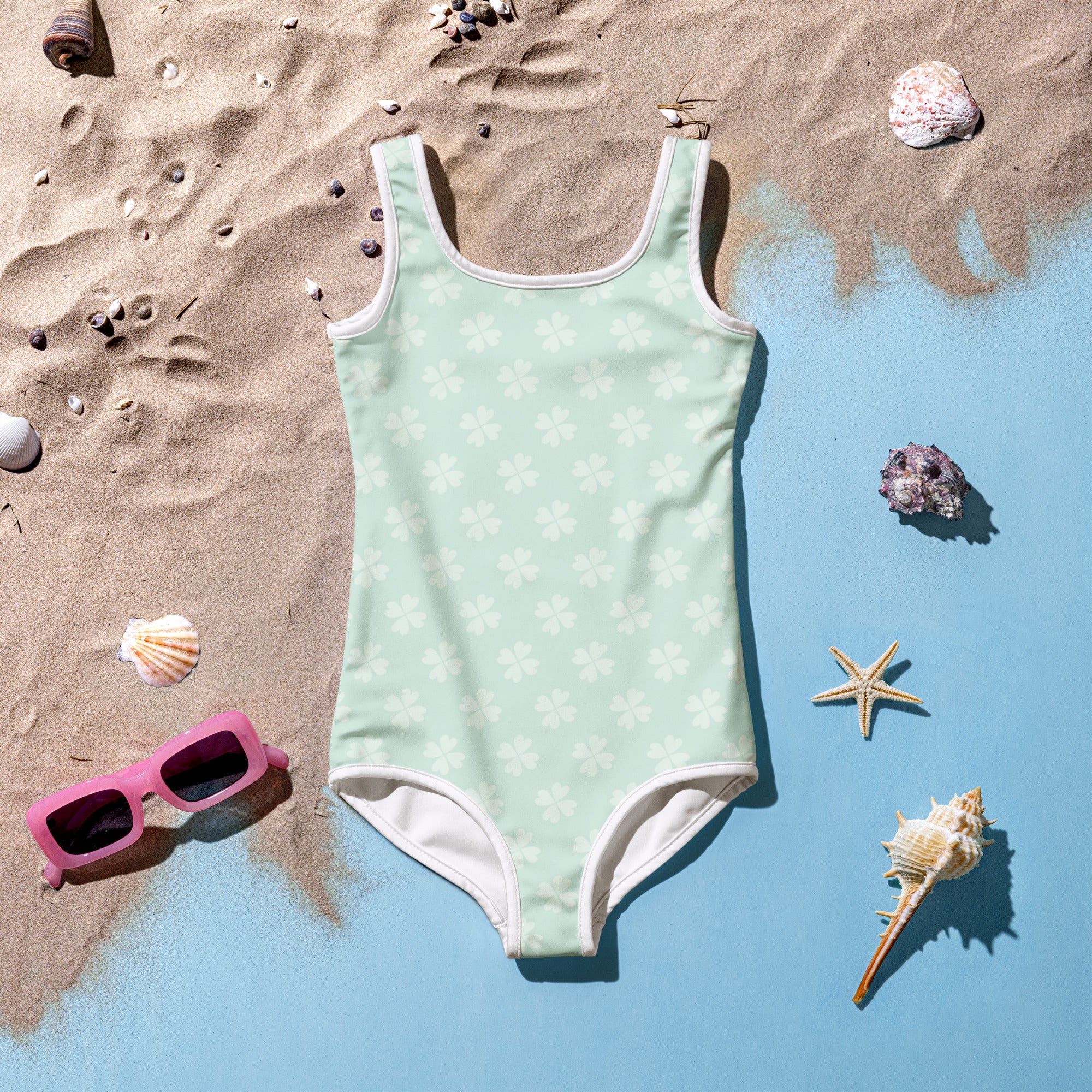 Girls mint shamrock buttery soft one-piece swimsuit with subtle white floral pattern and UPF 50 plus protection